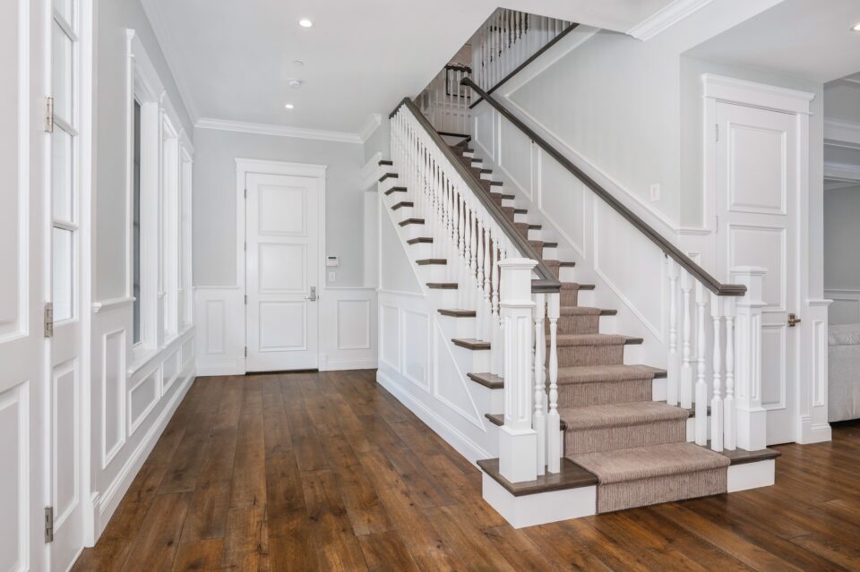 Wooden staircase in a new construction home in Encino, California